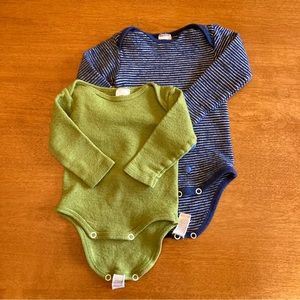 2 Cosilana merino wool baby onesies. Made in Germany.